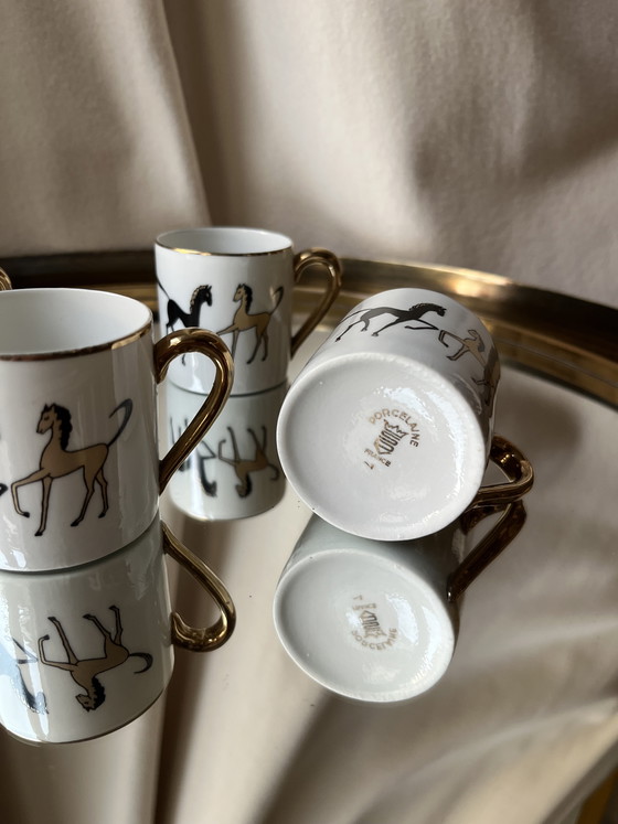 Image 1 of Set di 4 tazzine da caffè espresso vintage in porcellana francese con motivo a cavallo dorato, anni '70, stile metà secolo.