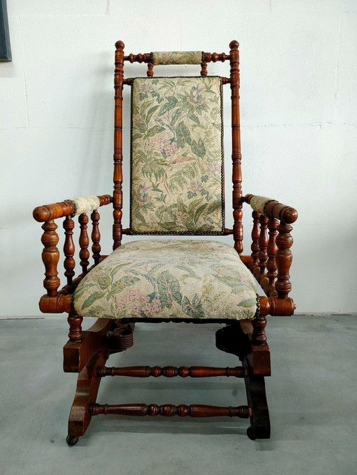 Sedia a dondolo antica vintage con meccanismo a bobina