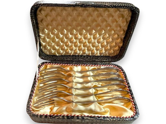 Image 1 of Antieke Duitse taartvorken van Wellner, daterend uit het begin van de 20e eeuw (ca. 1910-1930), in originele kist.