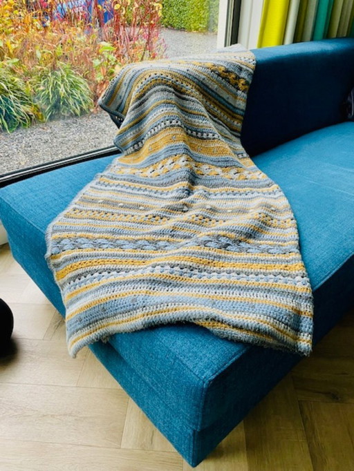 Scandinavian handmade crocheted rug in blue, gray and ochre