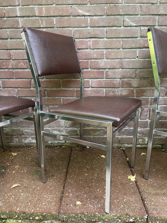Image 1 of Ensemble de 4 chaises vintage milieu du siècle en chrome et simili cuir