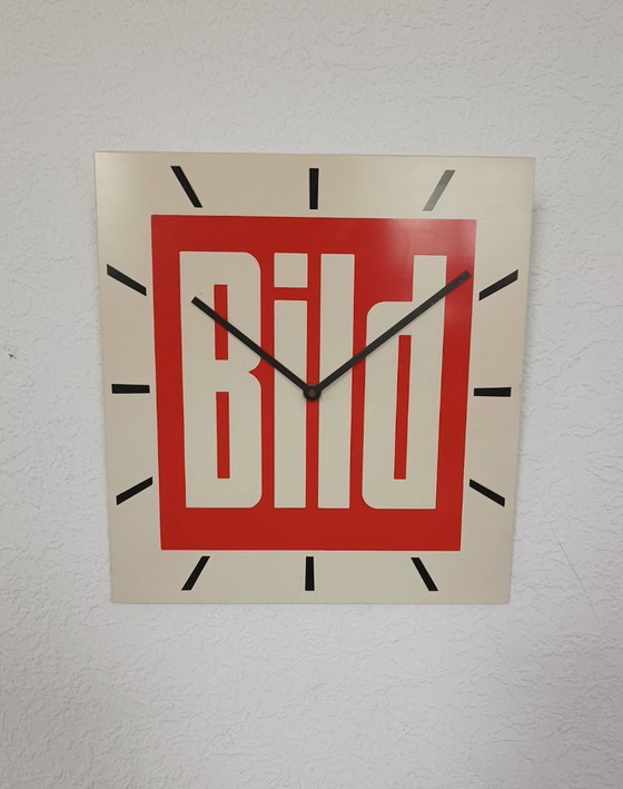 Image 1 of 1970s wall clock with advertising