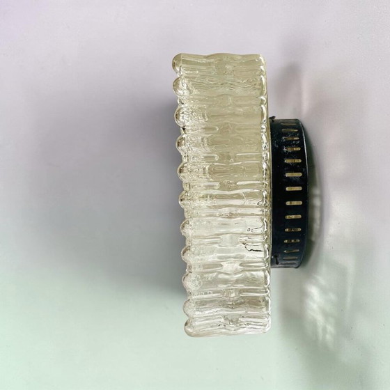 Image 1 of A large flush mount designed for both wall and ceiling application, in the 1970s.  This particular type of fixture tends to sit 