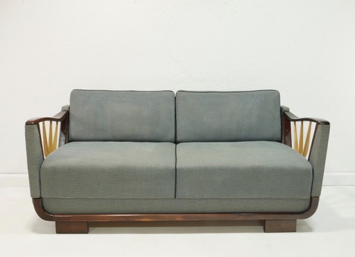 Sofá vintage de los años 50 con función reclinable.