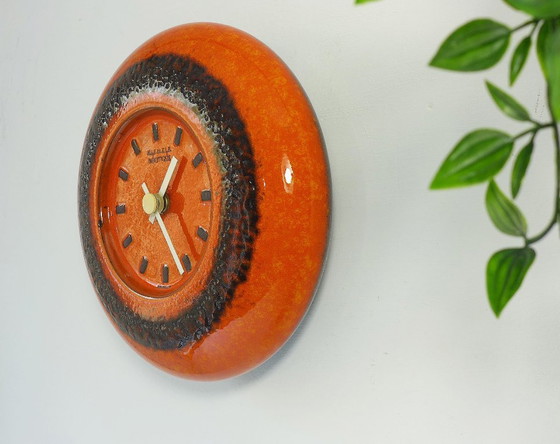 Image 1 of Vintage wall clock, Space Age, Fat Lava ceramic, Kienzle Orange, 60s/70s retro