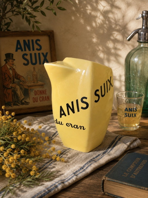 Brocca pubblicitaria vintage francese Anis Suix in ceramica gialla, anni '40-'50.