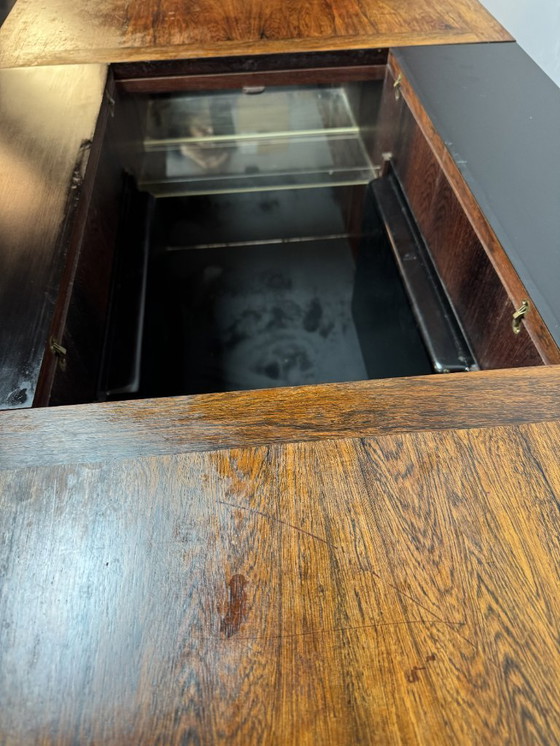 Image 1 of Iconic Mid-Century Sliding Bar Coffee Table in Solid Rosewood with Concealed Bar Compartments by E. Pedersen, Denmark 1960s.