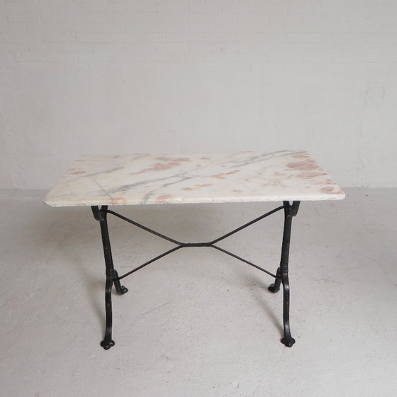 Image 1 of Table de bistrot avec plateau en marbre sur piètement en fonte, PARIS, années 1930