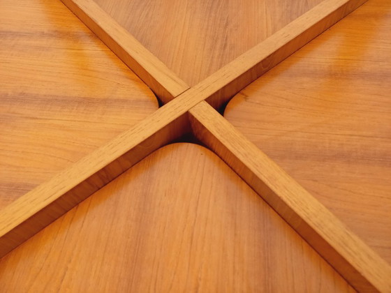 Image 1 of Vintage ronde salontafel met 2 bladen van Hugues Poignant, in teak en glas uit de jaren 60 en 70