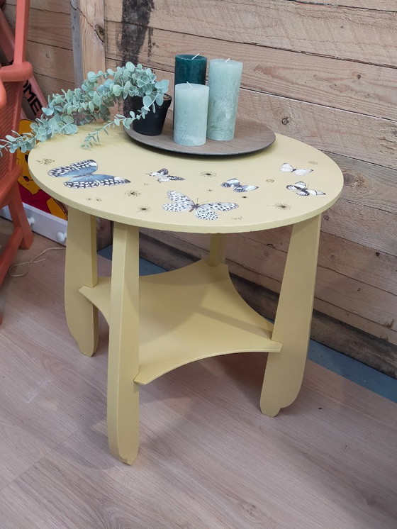 Image 1 of Round table with butterflies