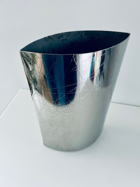 Image 1 of Metal designer vase with wood grain pattern – elliptical shape