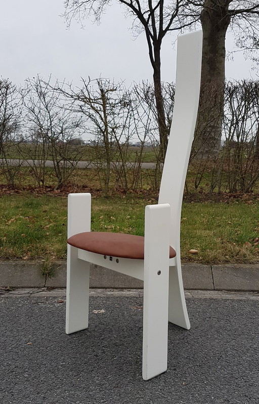 Golem dining chair designed by Vico Magistetti for Poggi