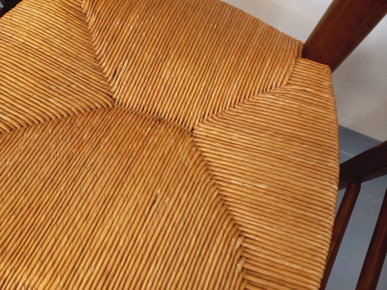 Image 1 of Set van 4 vintage brutalistische stoelen van hout en stro uit de jaren 60.