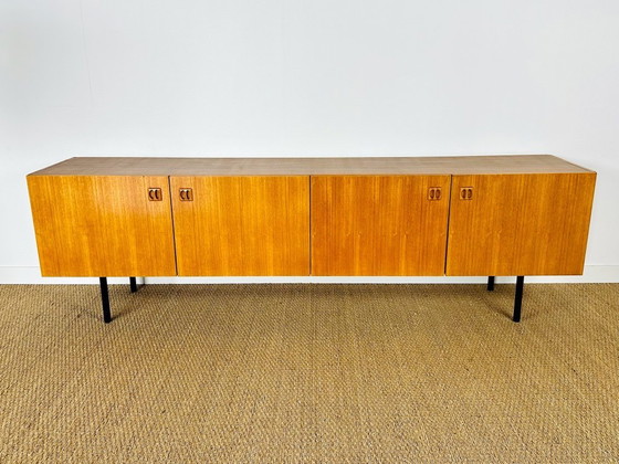 Image 1 of Minimalist Scandinavian sideboard in teak with black metal legs, 1960