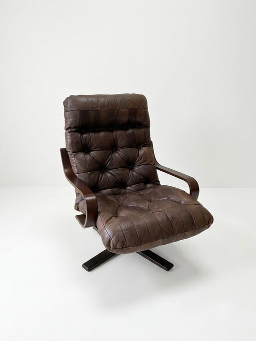 Silla giratoria de cuero de mediados de siglo