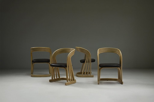 Set of 4 rattan dining chairs, 1980s Italy.
