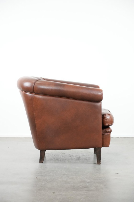 Image 1 of Cognac-colored cowhide leather club armchair in English style with a luxurious appearance