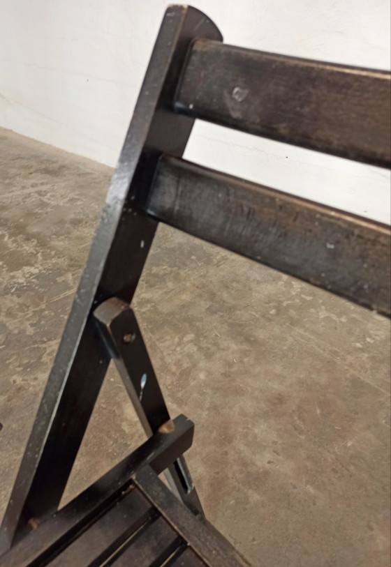 Image 1 of 2 vintage zwarte houten klapstoelen