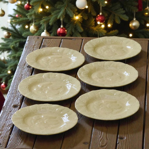 Vintage strawberry-patterned earthenware plates signed Genevieve Lethu