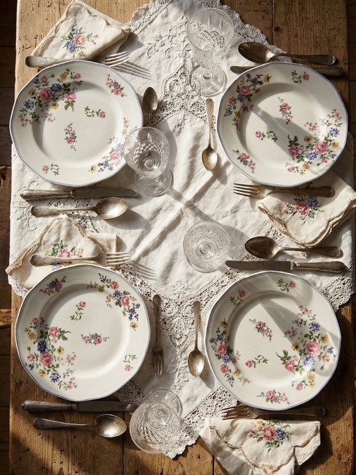 4 Bernardaud Limoges porcelain dinner plates with floral decoration from the 1920s-1950s