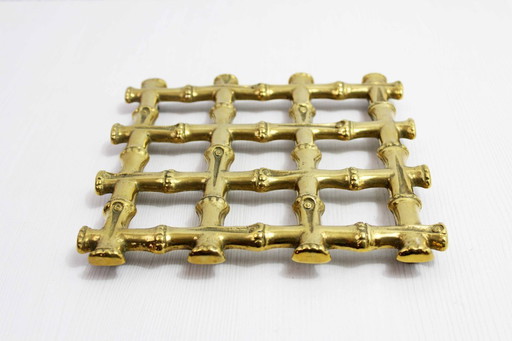 Faux bamboo brass trivet