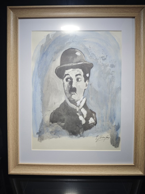 Lithografie van Charlie Chaplin in een lijst