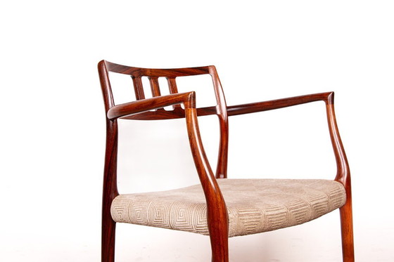 Image 1 of Fauteuil Danois en Palissandre et tissu, modèle 64 par Niels Otto Moller pour Moller’s Mobelfabrik 1960.