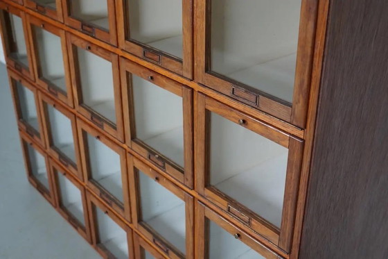 Image 1 of Antique large Dutch oak haberdashery cabinet with hinged doors, 1920s/30s
