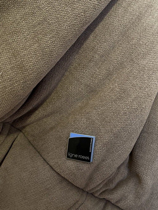 A Togo chaise lounge by Ligne Roset in ochre beige