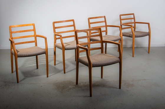 Image 1 of J.L. Mollers Model 68 armchairs in Oak with original fabric. Made in Denmark Circa 1990