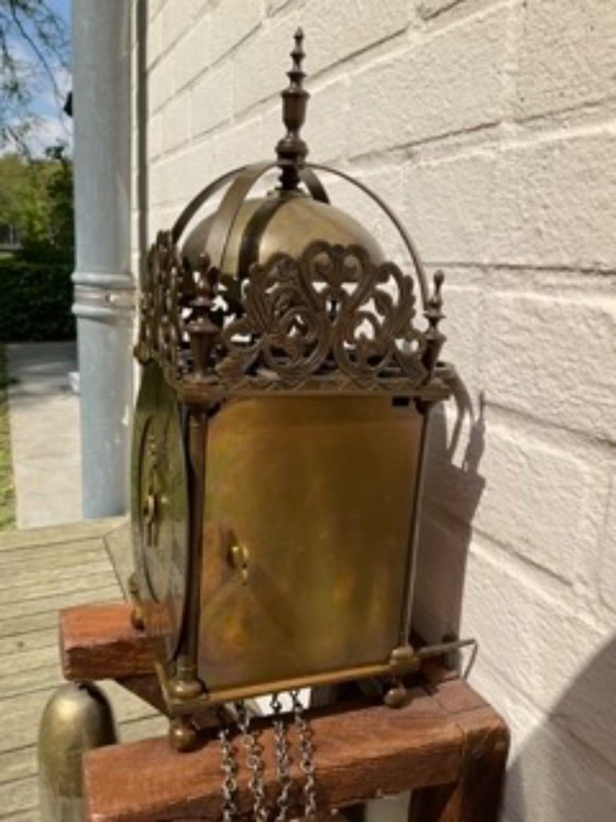 Image 1 of beautiful, well-functioning lantern clock "Tho: Moore Ipswich