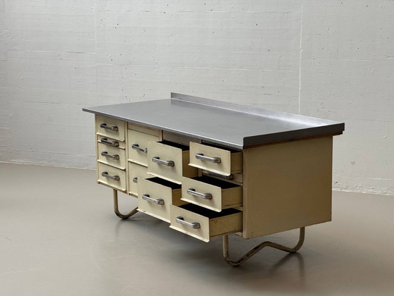 Image 1 of Industriële dressoir met roestvrijstalen blad, authentiek studio meubilair uit de jaren 50