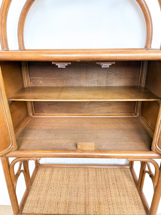 Image 1 of Vintage rattan bamboo manou arched cabinet with doors