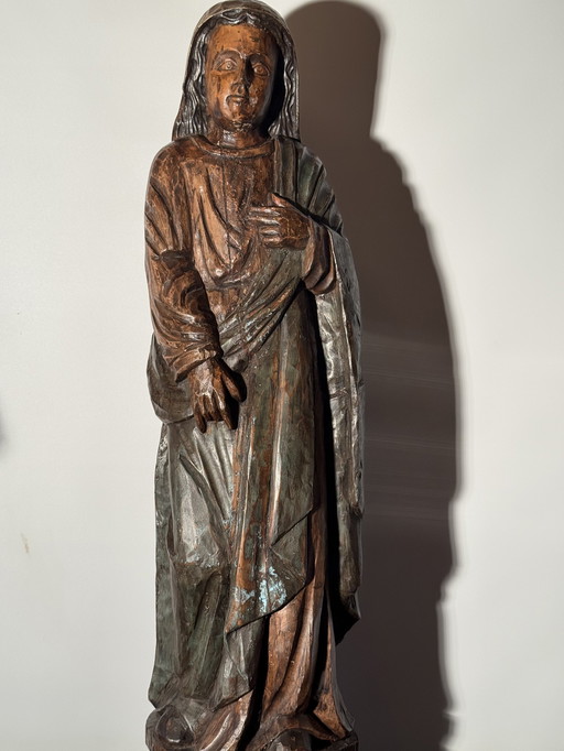 Old large wooden statue of Mary