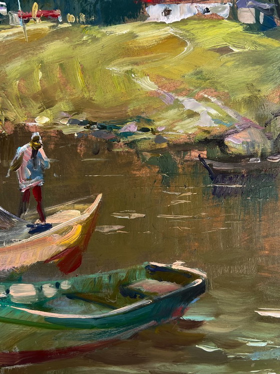 Image 1 of Fishermen on Boats near the Village