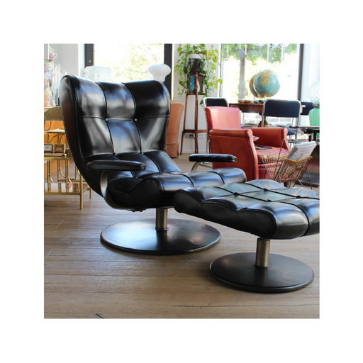Fauteuil met poef