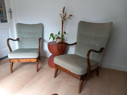 Classic pair of elegant Danish "His and Hers" armchairs