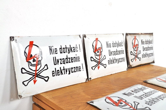 Image 1 of Enamel warning sign skull