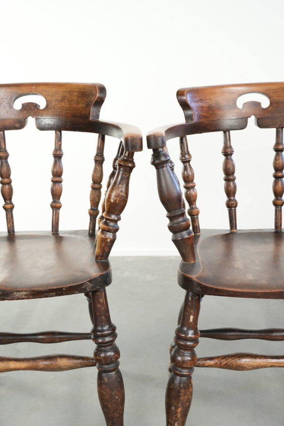 Image 1 of 4 x Antique wooden English pub/captain chairs from the late 19th century with character