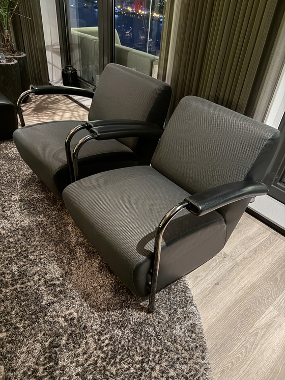 Image 1 of 2 Leolux Scylla stoelen + hocker - leer/stof - zwart/grijs