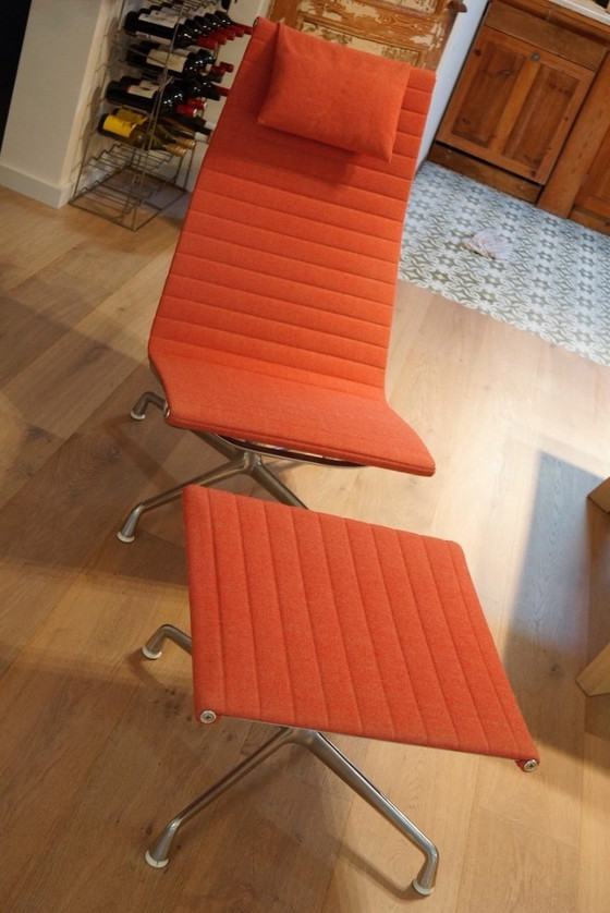 Image 1 of Eames aluminum Lounge chair with footstool coral red as new