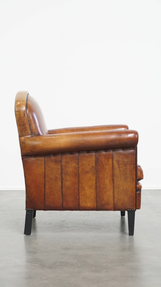 Image 1 of Schapenleren design fauteuil/ armchair in een cognac kleur