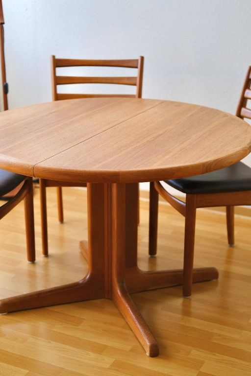 Solid teak dining table