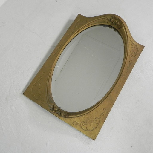 Gold oval mirror with cut edge, 1950s