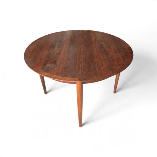 Vintage rosewood round extendable dining table