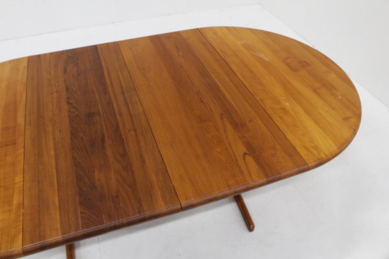 Image 1 of Vintage Danish round extendable dining table solid teak