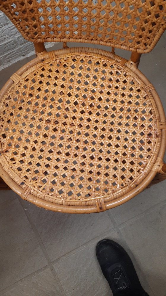 Image 1 of Set di 2 poltrone vintage in rattan con seduta e schienale intrecciati.