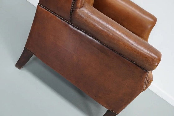 Image 1 of Vintage Nederlandse cognackleurige leren clubfauteuil