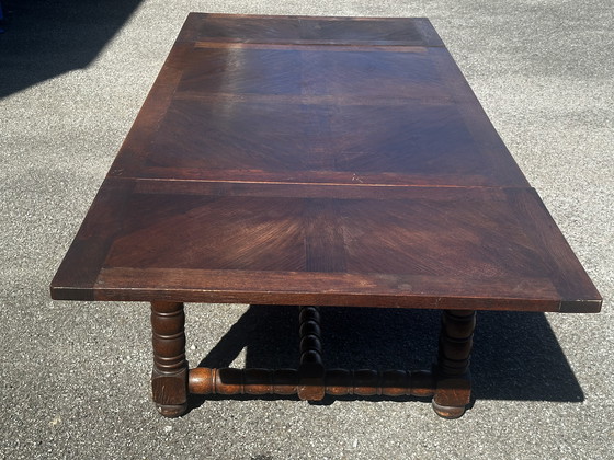 Image 1 of Table en chêne massif à rallonges, pieds tournés XIX e siècle 