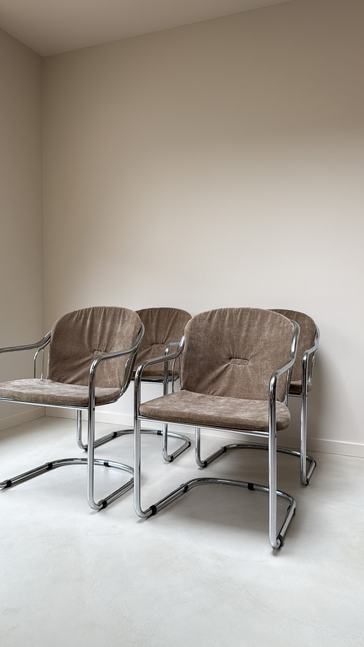Quatre chaises de salle à manger vintage à piétement luge en chrome